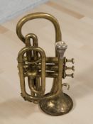 An early 20th century brass cornet.