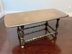 An Ercol stained elm rectangular coffee table, width 105 cm.