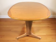 A G Plan teak oval extending dining table with internal leaf, unextended 150 cm x 100 cm x 75 cm.