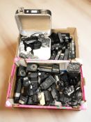 A quantity of camera auto winders, flashes, lens covers and similar accessories.