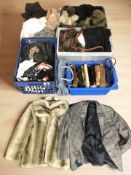 A large quantity of clothing, simulated fur items, lady's handbags, etc.