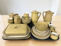 Thirty four pieces of Denby Ochre pottery table wares.