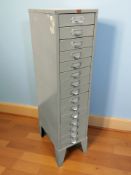 A fifteen drawer enameled metal index chest, height 119 cm.