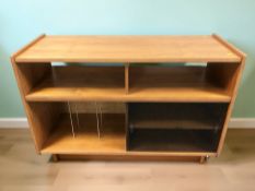 A teak low entertainment / record cabinet with sliding glass doors, 107 cm x 41 cm x 66 cm.