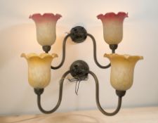 A pair of twin branch wall sconces with mottled glass shades, width 49 cm.