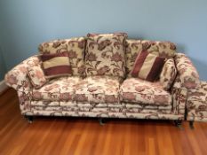 A contemporary Victorian style four piece lounge suite in floral upholstery,