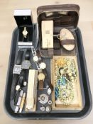 A group of wristwatches including Daniel Hechter, Rotary, Ingersol, etc, together with a slide rule,