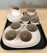 Twenty one pieces of Poole tea china.