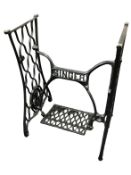 A cast iron Singer treadle sewing machine base.