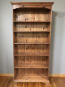 A modern pine open bookcase, 95 cm x 31 cm x 197 cm.