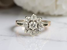 A diamond cluster ring, approximately 1.0 carat, size N CONDITION REPORT: 4.