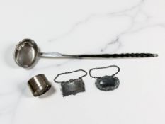 A silver toddy ladle with wrythen horn handle, length 39cm, together with a silver napkin ring,