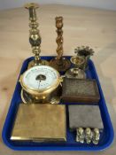 A reproduction ship's brass barometer, a piece of trench art, candlestick,