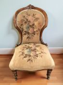 A Victorian mahogany lady's occasional chair.