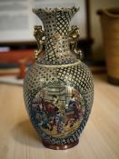 A large Japanese earthenware twin-handled vase, height 45 cm.