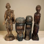 A group of four wooden busts and figures, tallest 29cm.