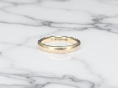 A 9ct gold band ring, size L CONDITION REPORT: 2.