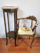 An inlaid mahogany corner armchair and a circular plant stand.