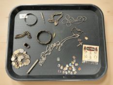 A group of silver and white metal jewellery to include bracelets, bangles, coin bracelet,