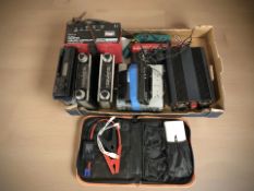 A group of electricals including cordless screwdriver, car radios, battery charger, etc.