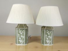 A pair of contemporary ceramic table lamps with shades, height 55 cm.