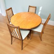 A G-Plan teak dining table and set of four chairs