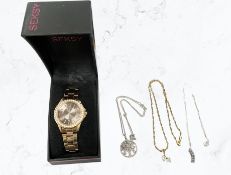 A silver and tanzanite pendant on chain, two further silver pendants,