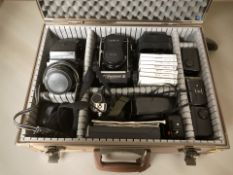 A camera case containing Mamiya C330 twin lens camera, a Zenza Bronica AE-II camera,