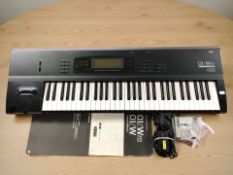 A Korg 01-WFD music workstation, no lead, with manual.