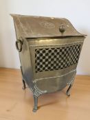 A Victorian brass serpentine coal receiver, height 54 cm.