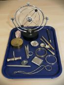 A modern orrery, together with a group of pens, corkscrew, mineral specimens, bangles, etc.