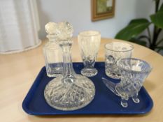 A crystal ship's decanter, further decanter, a Swatkins ice bucket, and two vases.