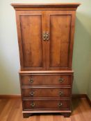 A reproduction yew wood drink's cabinet,