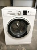 A Hotpoint 7kg washing machine.