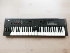 A Yamaha MX61 keyboard, with lead.