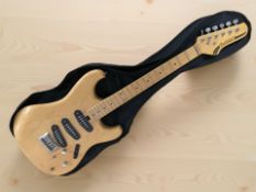 An Ibanez Roadster series electric guitar, with soft carry bag.