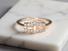 A 9ct rose gold pink diamond cluster ring, 0.