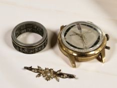 A split pearl bar brooch, an oriental revolving bi-metal band ring,