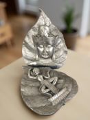 Two silvered composition easel panels, depicting Buddha,