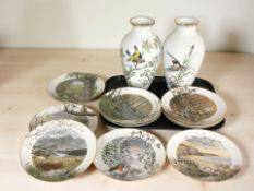 A pair of Franklin porcelain woodland bird vases, height 28 cm,