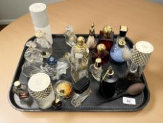 A group of vintage and later perfume bottles and scent atomisers to include Ralph Lauren, Shalimar,
