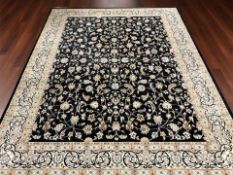 A machine made carpet of Iranian Tabriz design,