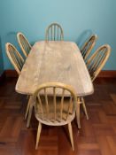 An Ercol elm and beech rectangular dining table, 153 cm x 79 cm x 71 cm,