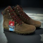 A pair of Vivo Barefoot Tracker FG L dark brown leather walking boots, UK size 6.