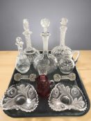 A group of crystal decanters, bowls, pair of knife rests, etc.