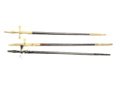 Three fraternity swords, in scabbards.