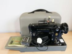 A Singer 319K electric sewing machine with lead and pedal,