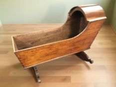 A Victorian mahogany rocking crib, length 104 cm.