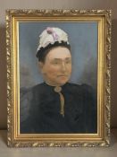 An overpainted portrait print of a Victorian lady, 48 cm x 34 cm.