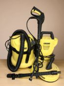 A Karcher WD2 wet and dry vacuum, and a K2 compact pressure washer.